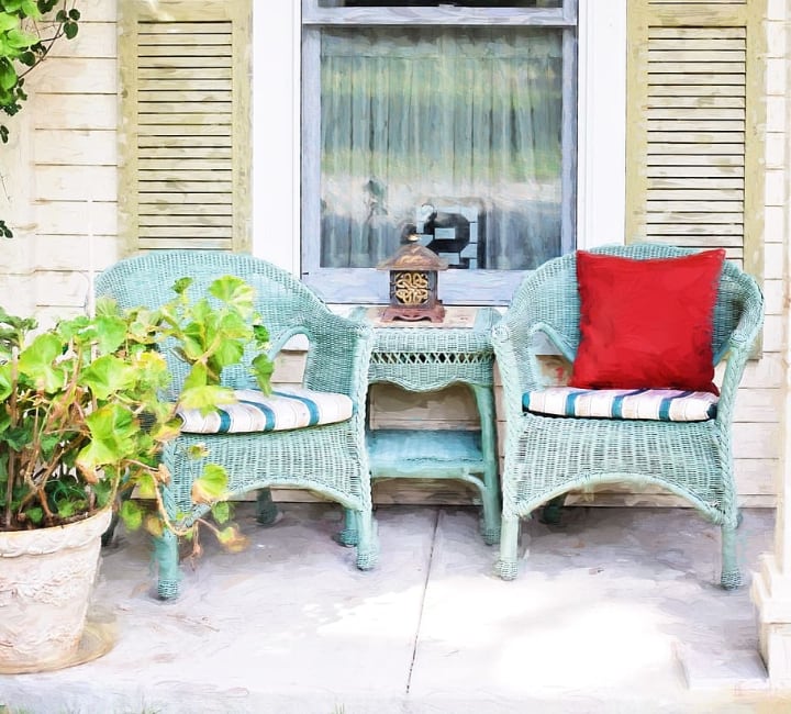 blue rattan garden furniture on the porch