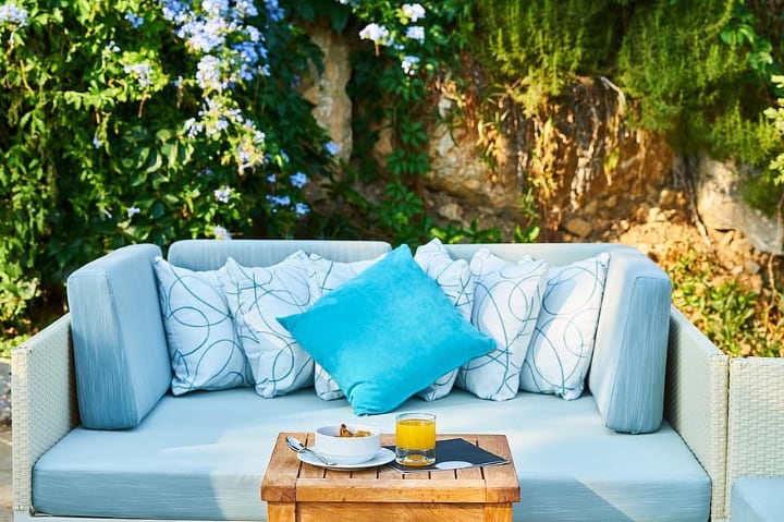 cozy rattan furniture in the garden