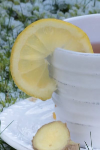 lemon tea on a white tea cup