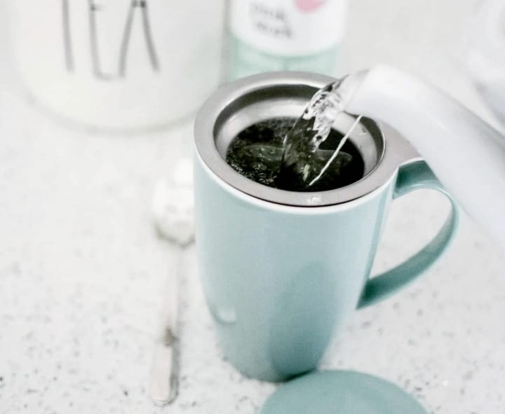 pouring hot water to the hot water