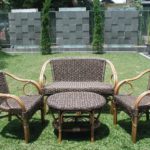 rattan garden furniture on grass