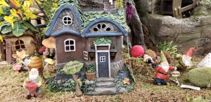 Solar garden decor Small fairy house pixie Log on Wheels outdoor ornament home 