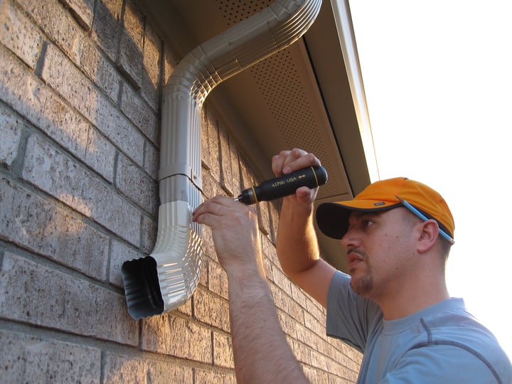 adjusting the downspouts