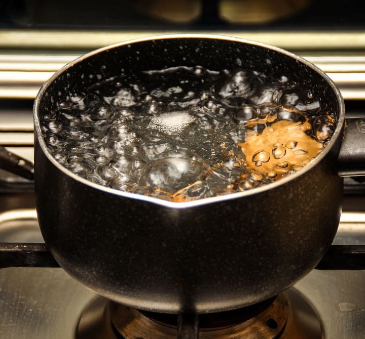 boiling water in a small pan