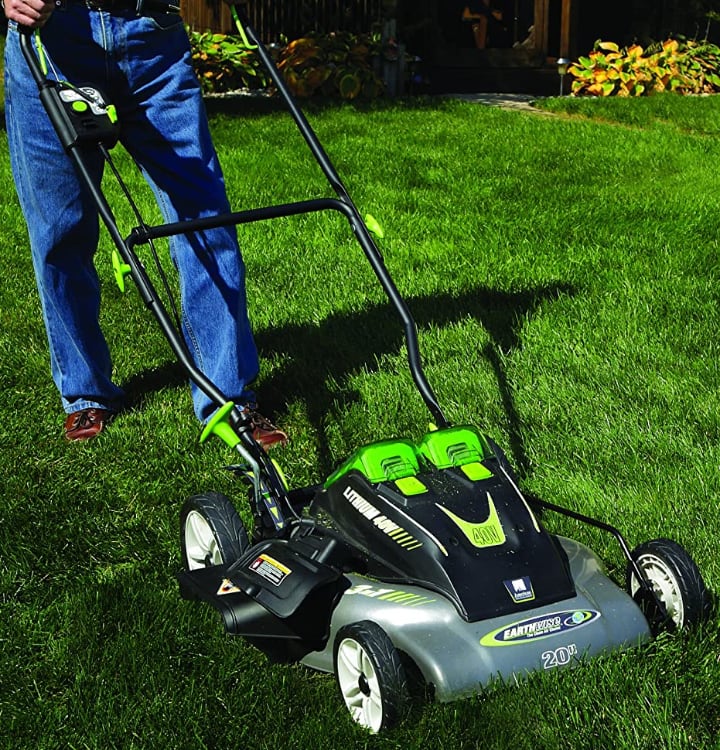 electric lawn mower in action