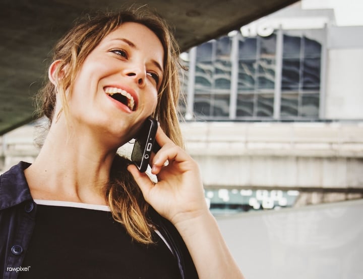 happy woman on phone