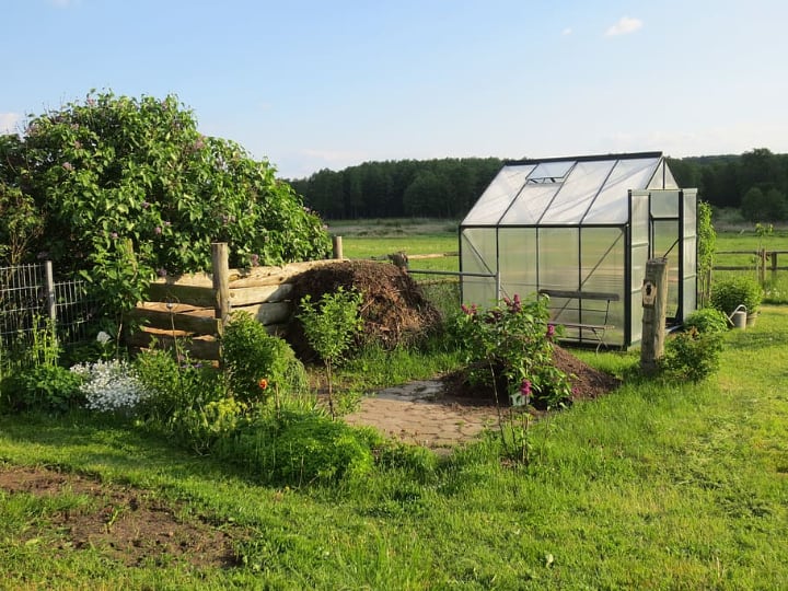 beautiful garden with a mini greenhouse