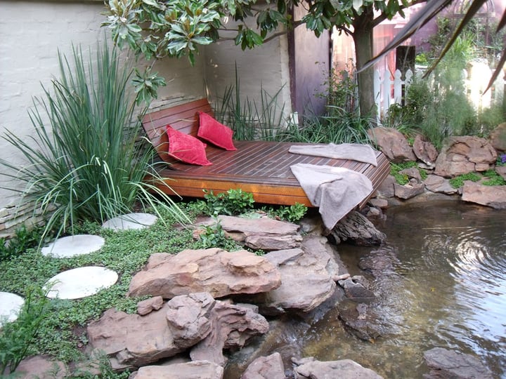 garden design with pond and bed