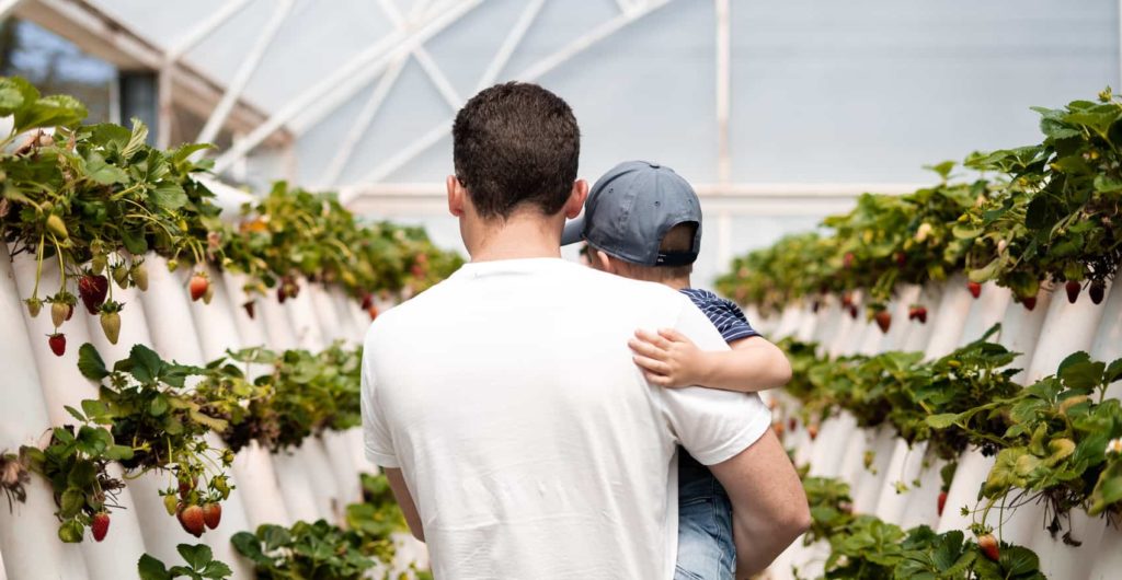 planted well founder with child on farm