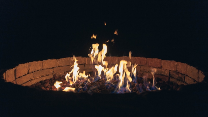 brick fire pit at night