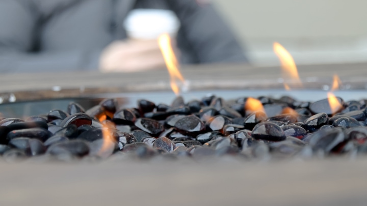 gas fire pit with black rocks