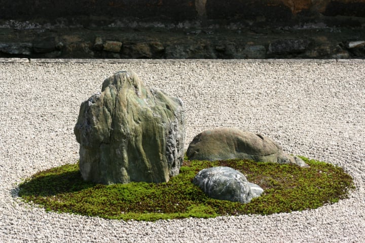 large garden rock on huge space