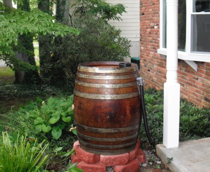 rain water harvesting barrel with overflow pipe