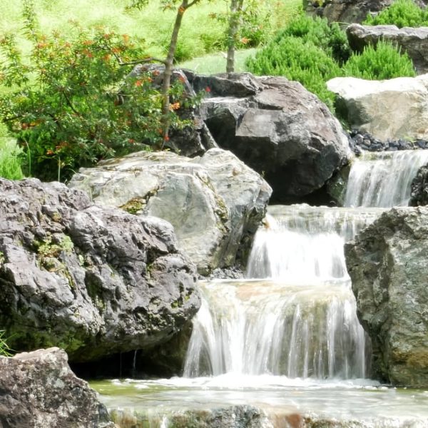 waterfall with rocks in the garden