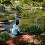 meditating in a japanese garden