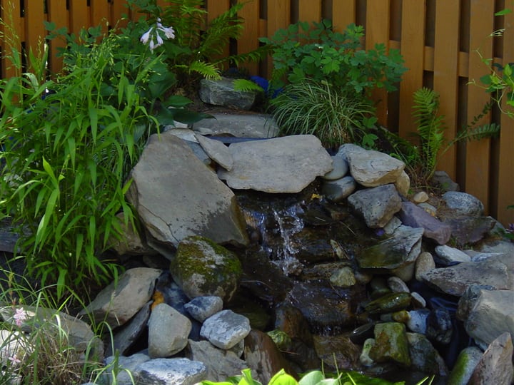 diy waterfall on pond