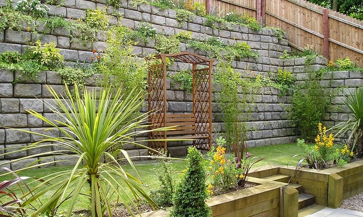 cobblestone retaining wall garden landscape
