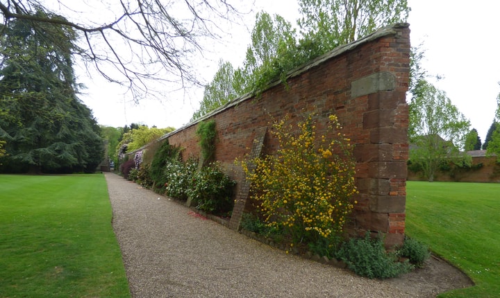 knock down brick wall garden