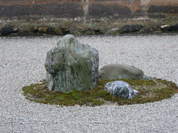 rocks representing islands on a zen garden