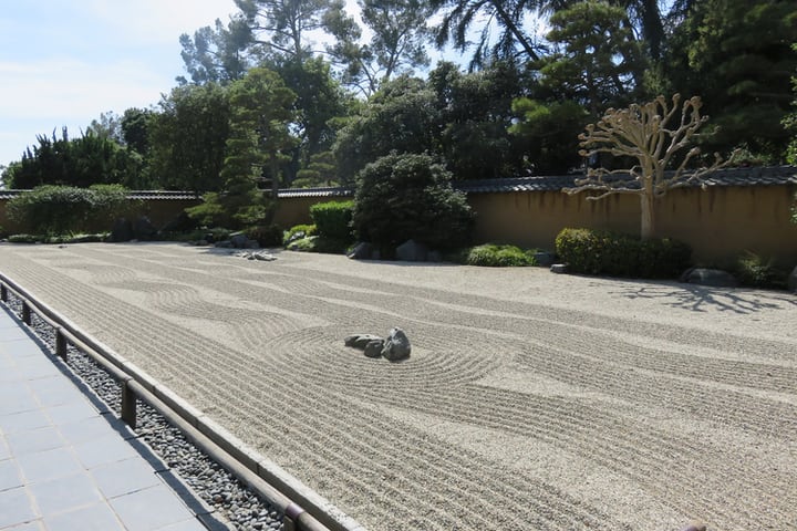 swirls and waves in the sand on a zen garden